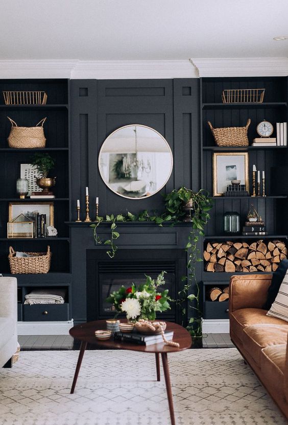 Create a focal point by adding a mantel in the middle of the room.